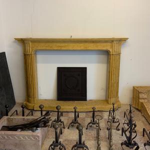 Antique yellow marble fireplace